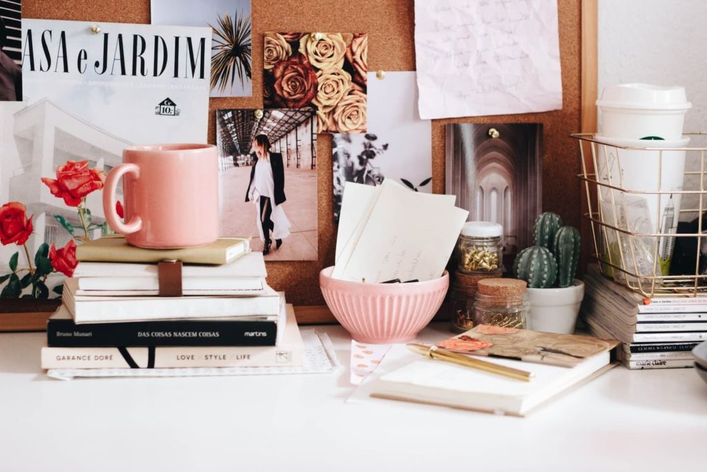 desk with books and other items